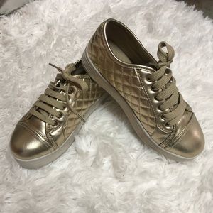 Gold quilted platforms